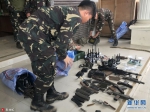 菲律宾政府军清剿马拉维武装分子 收缴大批武器弹药（组图） - 人民网