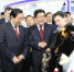 全国政协副主席齐续春（左前二）在甘肃省委书记林铎（右前三）陪同下，在甘肃国际会展中心参观兰洽会特色展馆。牟健 摄 - 人民网