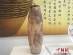 图为峰会期间展出的陶瓷作品。　杜萍 摄 - 甘肃新闻
