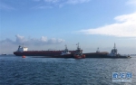 （XHDW）新加坡海域一挖沙船倾覆 4名中国籍船员失踪 - 人民网
