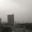 12月28日下午，冷空气入境逾两个月无降水的兰州城区，林立的高楼之间沙尘弥漫。　冯志军　摄 - 甘肃新闻