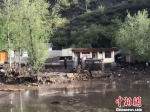 图为强降雨过后岷县受灾的山村。　钟欣 摄 - 甘肃新闻