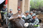 定西市组织七县区民兵奔赴岷县救灾 - 人民网