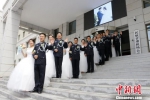 图为集体婚礼现场。　毛思程 摄 - 甘肃新闻