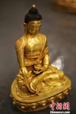 同时，13尊尼泊尔手工青铜佛造像、3件佛教法器、20幅精品传世唐卡也将展出。　钟欣 摄 - 甘肃新闻