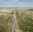 库布其首条穿沙公路 矗立在大漠的无形丰碑 - 人民网