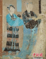 图为莫高窟第12窟晚唐时期《母子襦裙纹样》。敦煌研究院供图 - 甘肃新闻