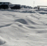 图为12月上旬，连遭降雪降温天气后的甘肃酒泉市戈壁雪景。　冯志军 摄 - 甘肃新闻