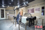 图为金城文化博物馆展示的兰州近代工业的开端，左宗棠创办的兰州织呢局。　郭炯 摄 - 甘肃新闻