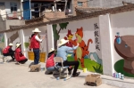 学校组织师生在郭嘉镇学区开展校园墙面美化活动 - 兰州城市学院
