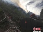 甘肃迭部森林火灾烟点继续减少 形势朝有利方向发展 - 甘肃新闻