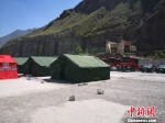 8月11日，甘肃陇南消防支队已抵达集结营地完成帐篷搭建和灾害现场勘察工作。　高康迪 摄 - 甘肃新闻
