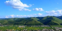 图为甘肃中部乡村岷县盛夏时节田园风景。(资料图) 马万安 摄 - 甘肃新闻