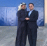 图为贾俊(右一)与外国友人合影。(资料图) - 甘肃新闻