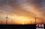 图为甘肃酒泉市境内的风力发电厂。(资料图)酒泉市委宣传部供图 - 甘肃新闻