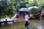 （图片故事）（1）重庆永川：雨中逆行者 守护百姓安全的地质灾害监测员 - 人民网