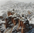 图为雪后的张掖丹霞地貌，宛如仙境。(资料图) 杨艳敏 摄 - 甘肃新闻