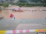 图为7月21日，随着黄河兰州段水位上涨，快艇、羊皮筏子等水上项目停业。　史静静 摄 - 甘肃新闻