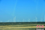 图为酒泉市瓜州县境内的风电项目。(资料图) 魏金龙 摄 - 甘肃新闻