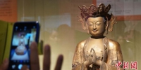 图为敦煌研究院举办的佛教艺术展。(资料图) 魏建军 摄 - 甘肃新闻
