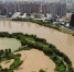7月5日，航拍黄河兰州段，随着刘家峡的泄洪，前段时间清绿色的黄河水重回黄土色。(资料图) 杨艳敏 摄 - 甘肃新闻