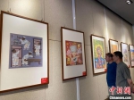 本次共展出100幅农民画，作品汇聚了甘肃省农民艺术家近两年的精心之作。　徐雪 摄 - 甘肃新闻