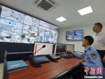 图为2021年8月，榆林窟文物保护研究所视频监控室。　张婧 摄 - 甘肃新闻