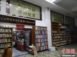王林开设于兰州市正宁路古玩城的书店已有近千平方米。　王牧雨 摄 - 甘肃新闻